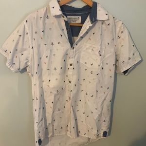 Free planet button down T shirt